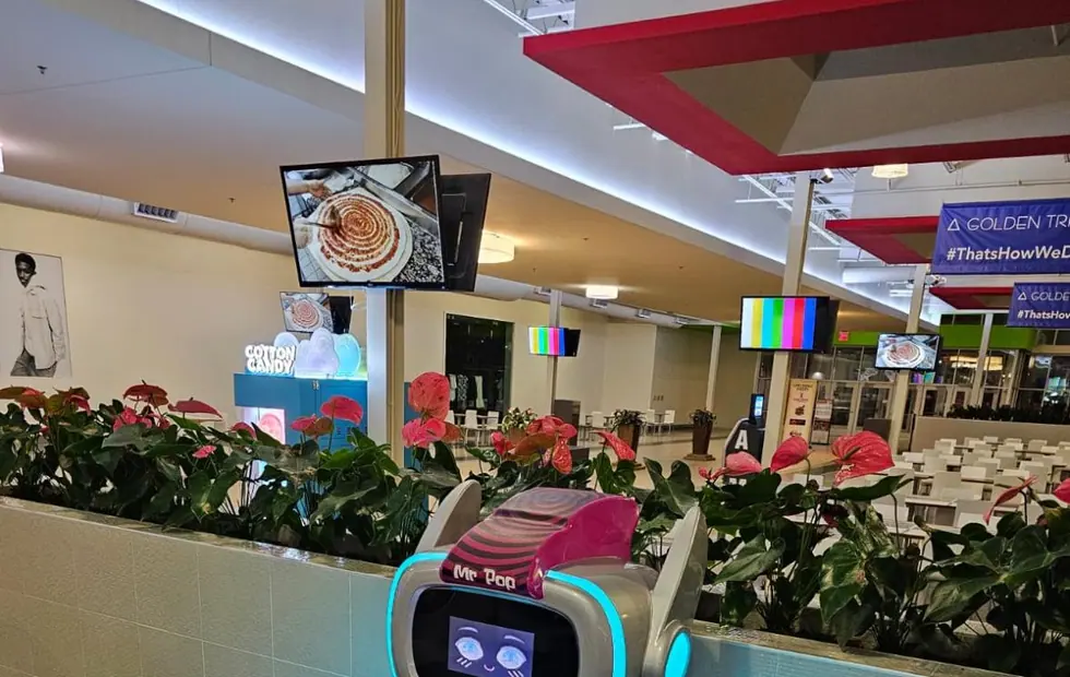 Mr. Pop-popcornrobot met klanten